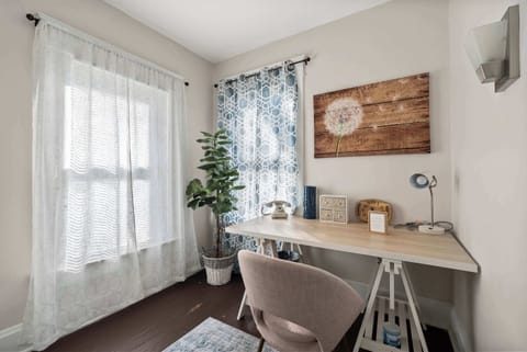 Escape to Unit 2283’s cozy home office & work on emails during your getaway