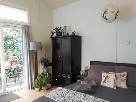 Comfortable queen size bed with armoire