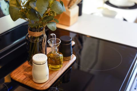 Olive oil, salt, pepper and cutting board.