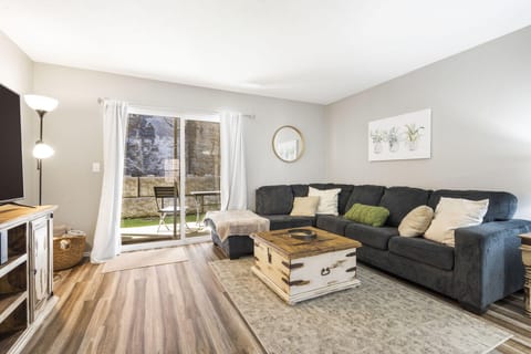 Make lasting memories with loved ones in this inviting condo - gather around the table for a friendly board game competition or snuggle up and enjoy a movie night on the TV in the evenings. Living room #1