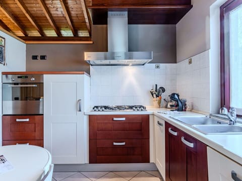 Kitchen, Kitchen Appliance, Countertop, Major Appliance, Cabinetry, Interior Design, Flooring, Wood, Home Appliance, Kitchen Sink