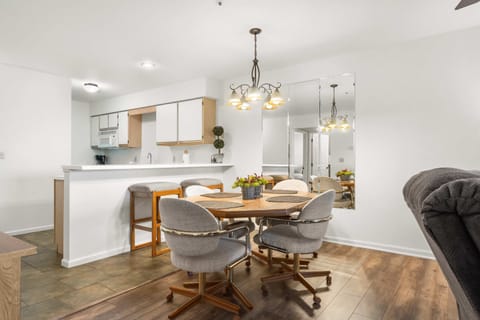 Grab a bite at the kitchen counter or gather for meals at the dining table for 4