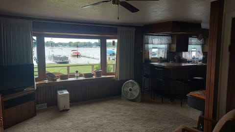 Beautiful view from the living room with sliding curtains and a 4 seat bar.