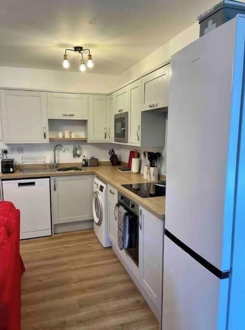 Kitchen: Washing machine, dish washer, oven, hob, air fryer, kettle, toaster.