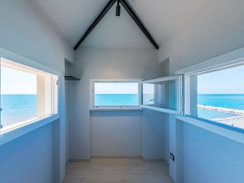 Furniture, Wood, Interior Design, Flooring, Kitchen, Cabinetry, Floor, Room, Major Appliance, Cupboard