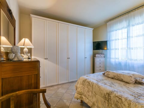 Furniture, Wood, Interior Design, Flooring, Kitchen, Cabinetry, Floor, Room, Major Appliance, Cupboard