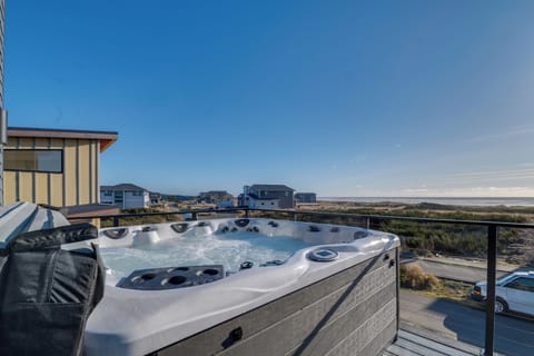 Balcony | 9-Person Hot Tub | Beach Views | Access From Living Room
