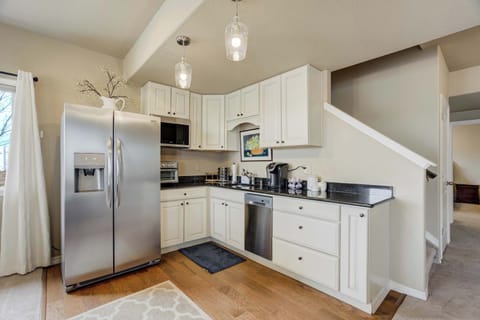 Bright and thoughtfully stocked kitchenette with full-size fridge, microwave, coffee maker, and ample prep space—perfect for light meals and snacks.













