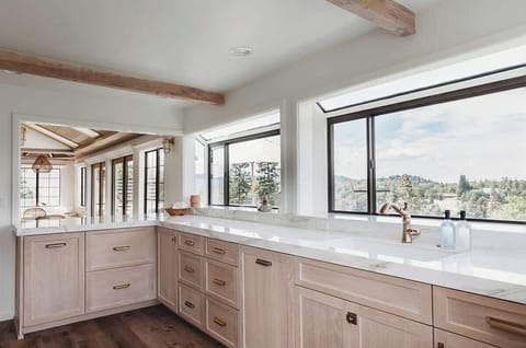 Every window on the front of the house has a panoramic view of the lake