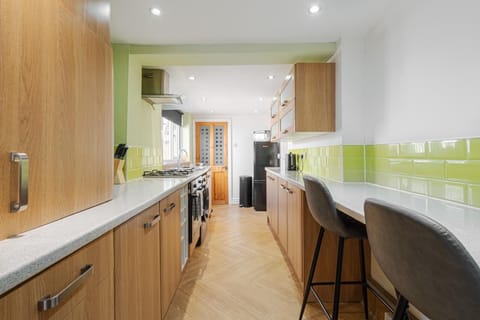 The fully fitted kitchen includes everything you need for a pleasant stay, with modern appliances, cookware, and essentials to make meal preparation easy.