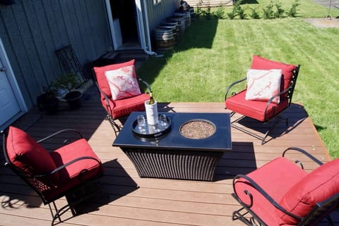 Enjoy an al fresco glass of wine as the sun goes down at the fire table 