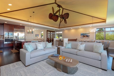 Spacious open concept living room with plenty of seating for everyone