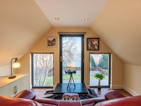 Furniture, Interior Design, Flooring, Wood, Ceiling, Floor, Room, Living Room, Lighting, Couch