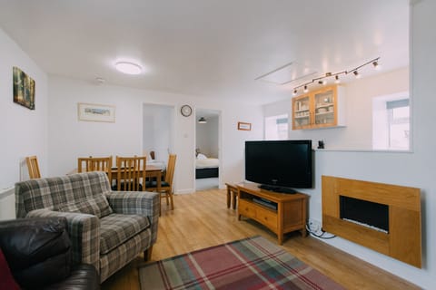 The Carthouse lounge with 42" smart TV at Trevalgan Farm Holidays