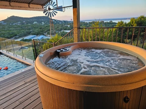 Hot tub with epic lakeside/hillside views