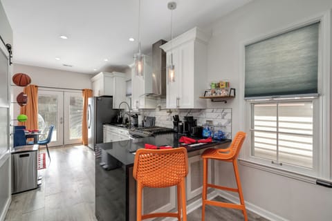 Bar seating for 2 in the kitchen counter space