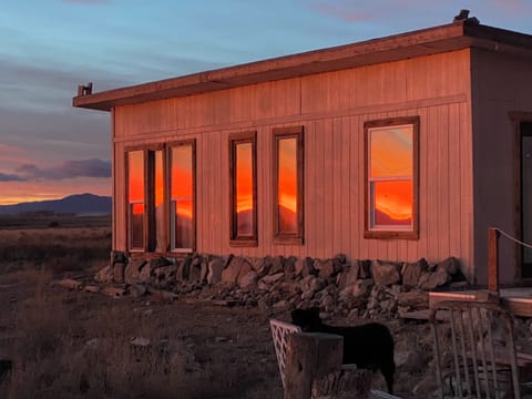 Sunset against the bedroom windows.