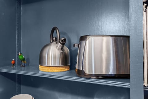 Kitchen 1: Bright and functional space to whip up your favorite dishes.