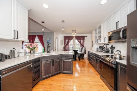 The elegant kitchen offers ample space & every home comfort