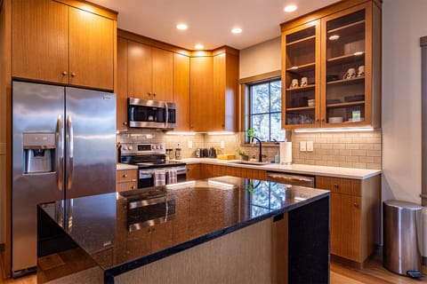 Granite countertops and modern stainless appliances