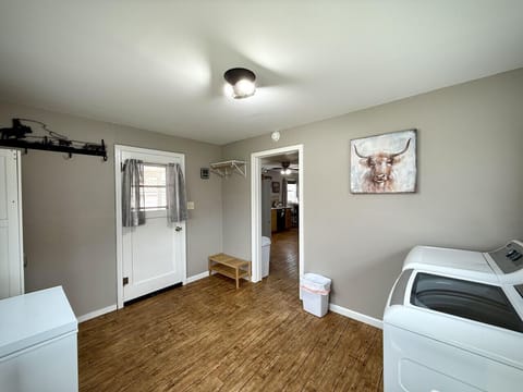 Laundry room with washer, dryer and utility sink