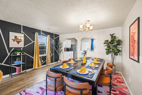 A spacious dining area with seating for eight