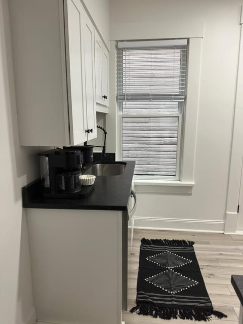 Elevate your culinary experience at Jungle House Airbnb with our sleek and modern kitchen, complete with stainless steel appliances and elegant finishes Your gourmet retreat in Short North Columbus