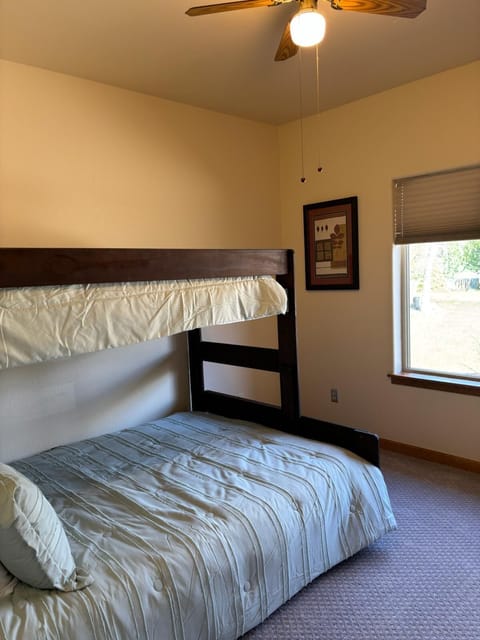 Third bedroom facing front yard, black out blinds