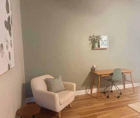 Master bedroom with dedicated workspace.