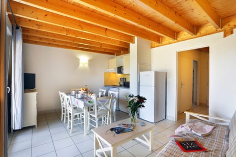 The living area is bright and spacious, perfect for relaxing after a wonderful day.