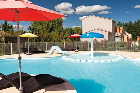 Soak in the sun and take a dip in the swimming pool.