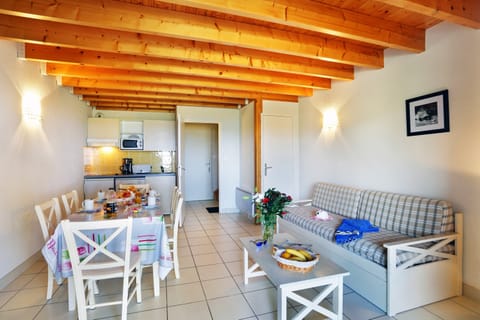 Sit back on the comfy sofa with a good book, or pay for TV services on-site.