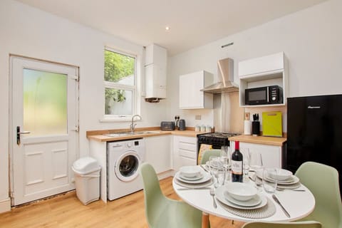 A fully equipped kitchen with everything you need to prepare a home cooked meal.