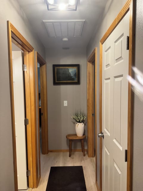 Looking down the hallway from kitchen- master to the right 2 bedroom to the left