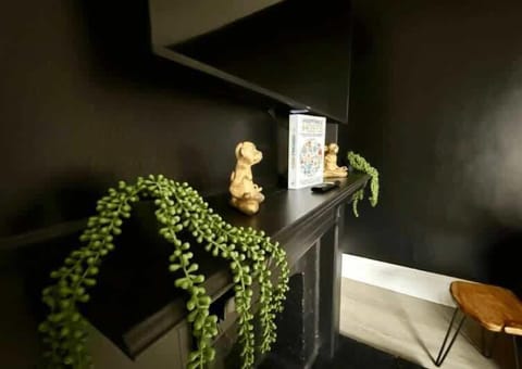 Dine in elegance in our Columbus Airbnb's dining area, where a sleek table and ambient lighting create the perfect backdrop for every meal!