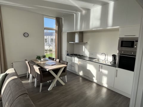 Kitchen, Flooring, Floor, Countertop, Major Appliance, Furniture, Kitchen Appliance, Cabinetry, Interior Design, Apartment