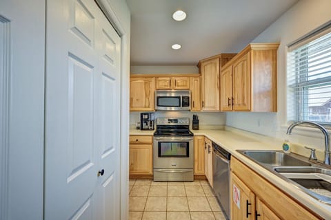 Laundry located behind doors on the left