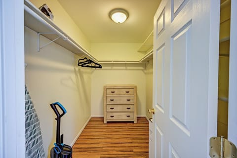 Primary bedroom walk-in closet