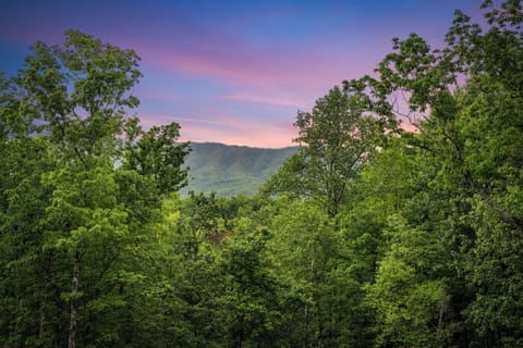 Relax on the deck with seating and Smoky Mountain views