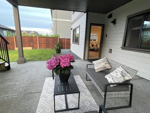 Outdoor patio and fenced yard