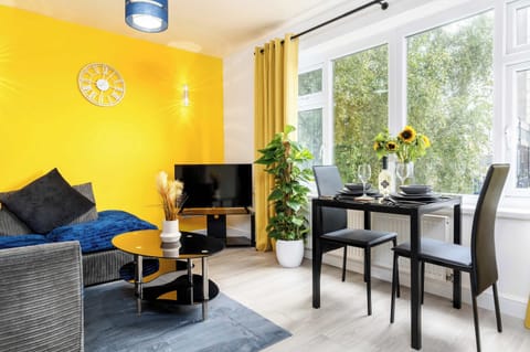 Welcome to Beech Hill, your perfect Sheffield retreat! Kick back and unwind in the living area, with a cosy couch and TV ready for a relaxing evening.