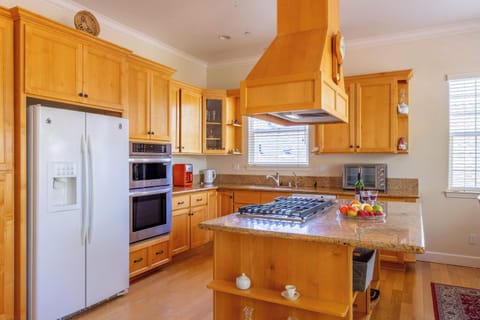 Cook in comfort with premium appliances and granite counters