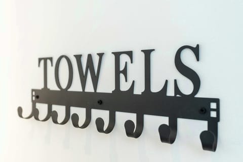 Bathroom 1 & 2 | Towel Holders | Bath Towel, Hand Towel, and Face Towel Provided for Each Guest