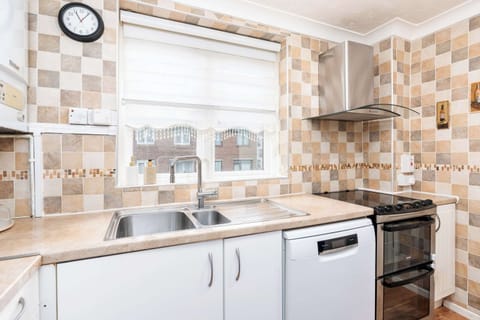 Fully equipped kitchen with dishwasher is ready for you to use and handle all your cooking needs.