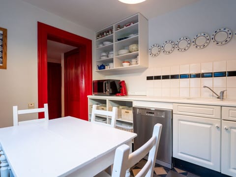 Flooring, Interior Design, Furniture, Floor, Ceiling, Kitchen, Major Appliance, Cabinetry, Room, Countertop