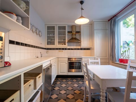 Kitchen, Flooring, Cabinetry, Interior Design, Countertop, Floor, Furniture, Wood, Ceiling, Kitchen Appliance