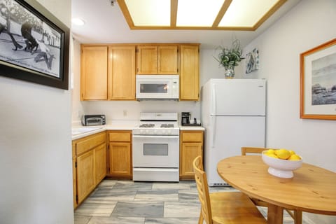 Upgraded flooring, a dining table for three and fully stocked kitchen for those after beach dinners!