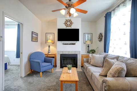 This charming one-bedroom condo features a king bed, full kitchen, private patio, and shared hot tub and BBQ access — all just a short stroll from the sun and shore.
