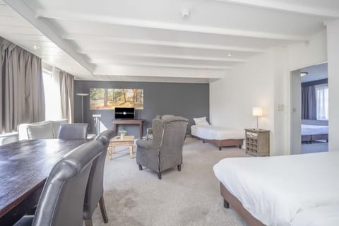 Living area. Exact unit will be assigned upon arrival. Views, colors, and decor may vary.