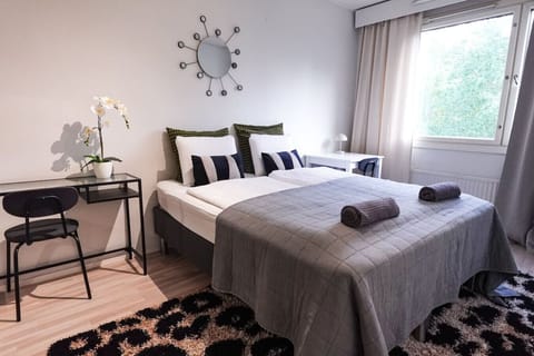 Sleep soundly in this inviting queen bed, your perfect retreat after a day of adventure.